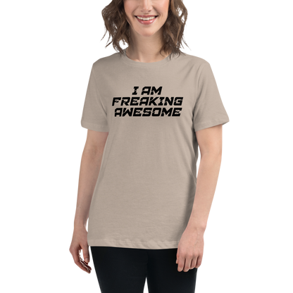 "I Am Freaking Awesome" printed on a heather stone women's relaxed t-shirt worn by a female