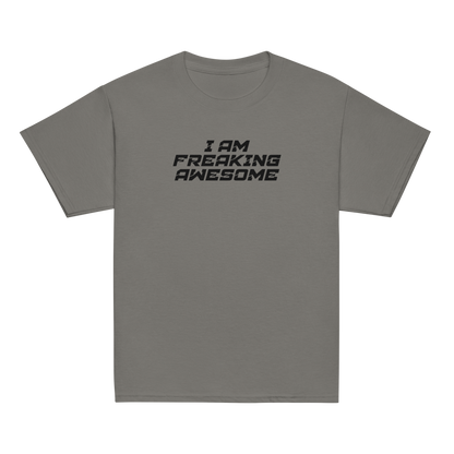 "I Am Freaking Awesome" printed on a charcoal youth classic tee laying on a flat surface