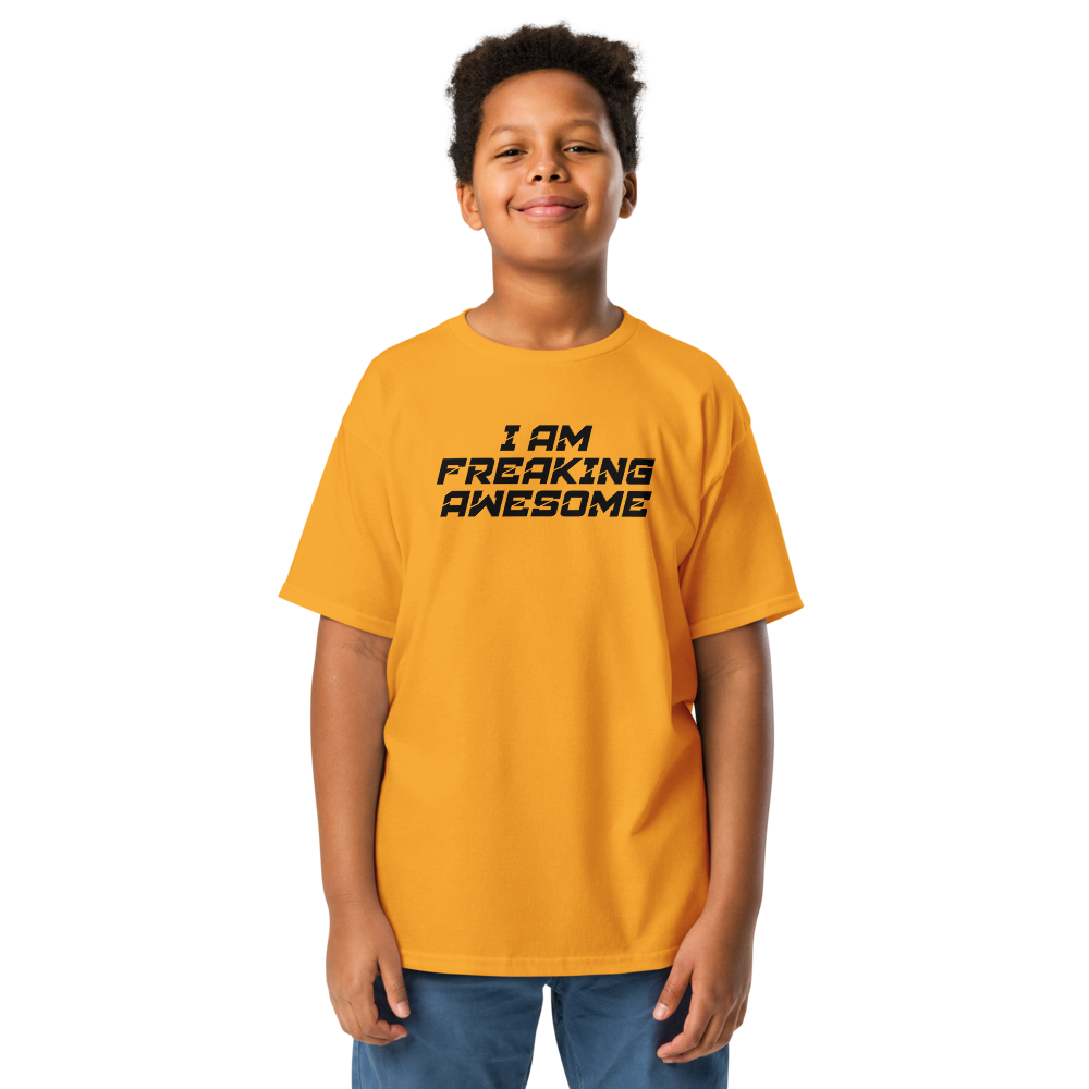 "I Am Freaking Awesome" printed on a gold youth classic tee worn by a male