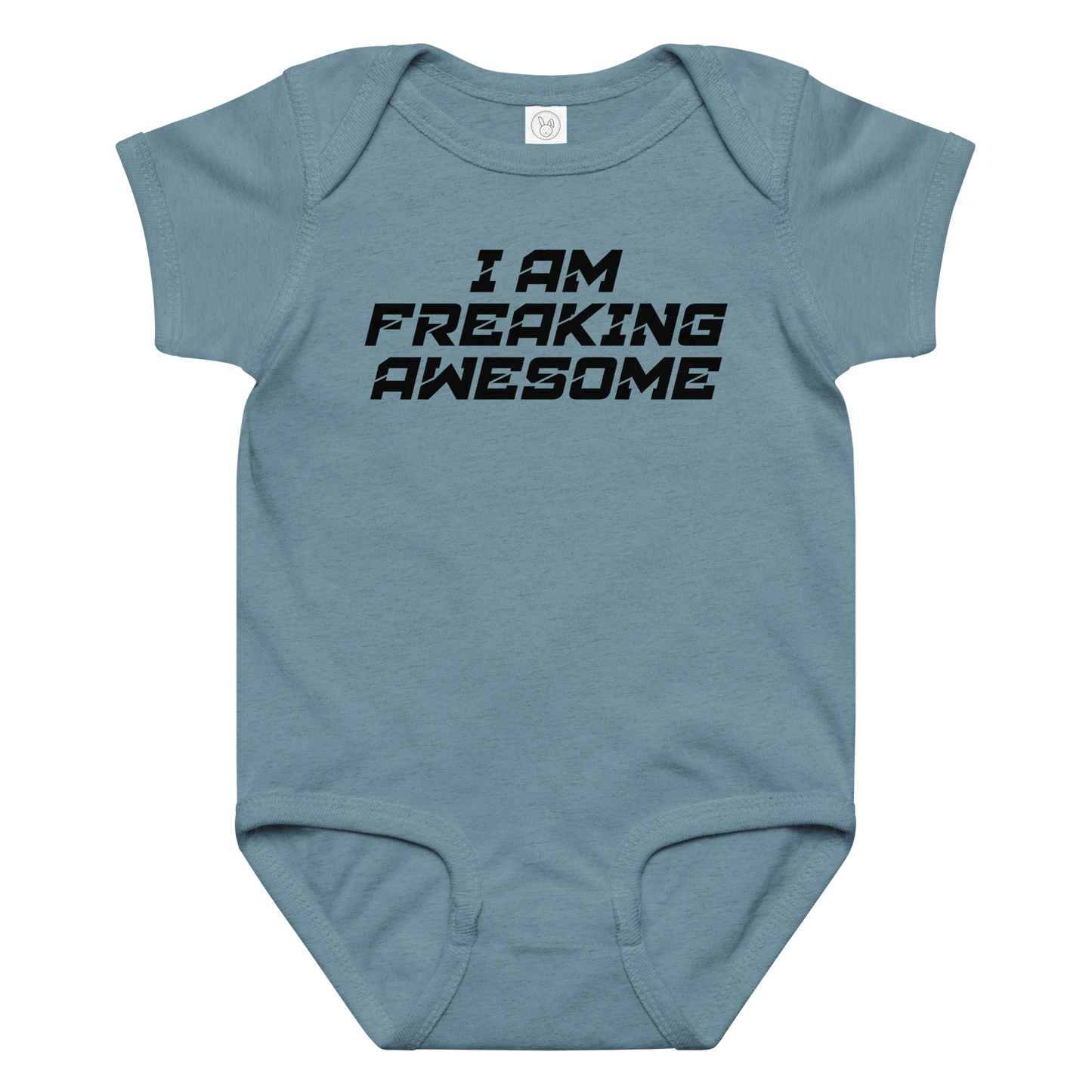 "I Am Freaking Awesome" printed on a vintage indigo baby jersey bodysuit laying on a flat surface amongst other clothes