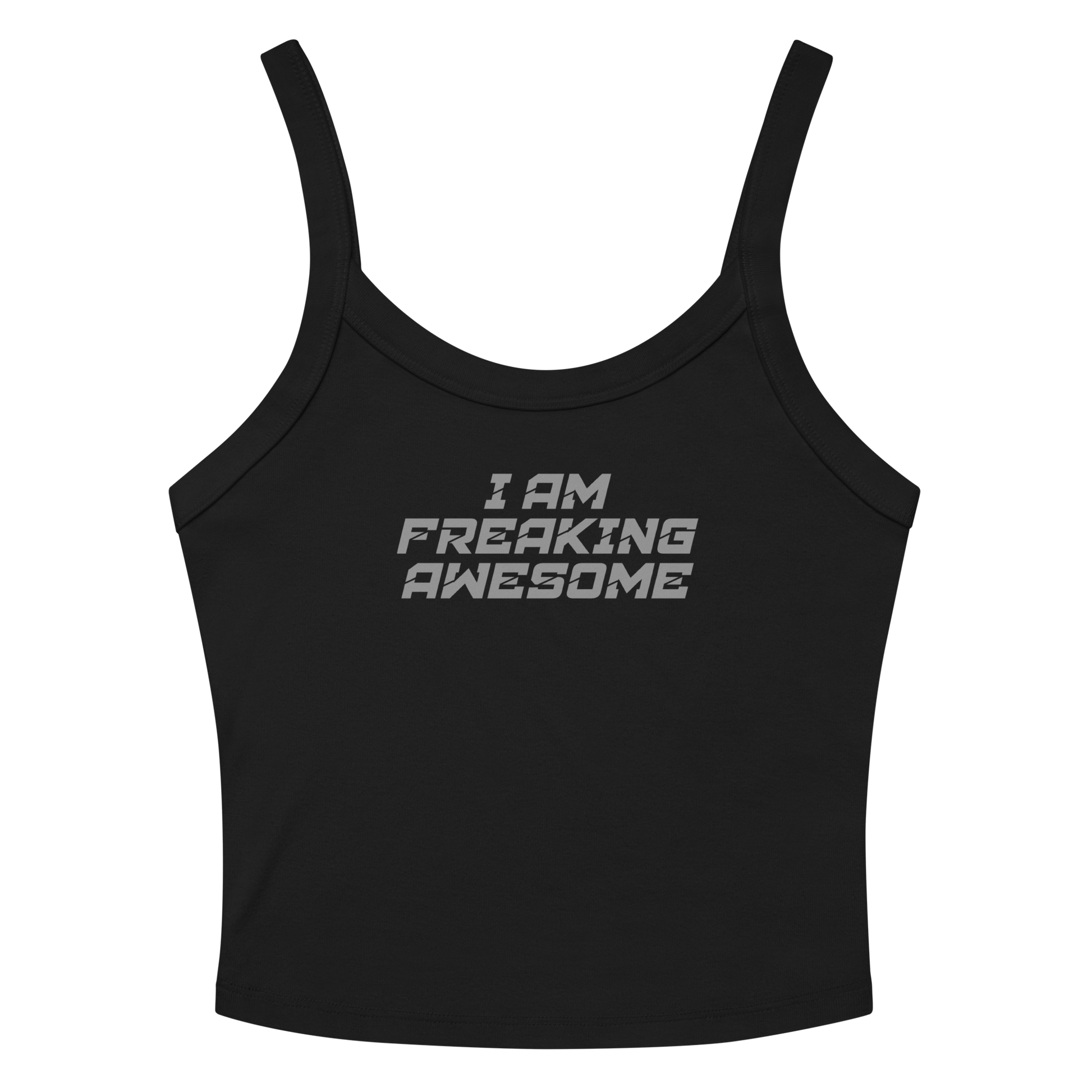"I Am Freaking Awesome" printed on a solid black blend women's micro-rib tanktop laying on a flat surface amongst sunglasses and shorts