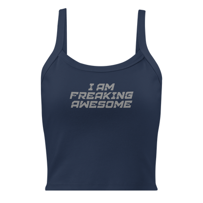 "I Am Freaking Awesome" printed on a solid navy blend women's micro-rib tanktop laying on a flat surface