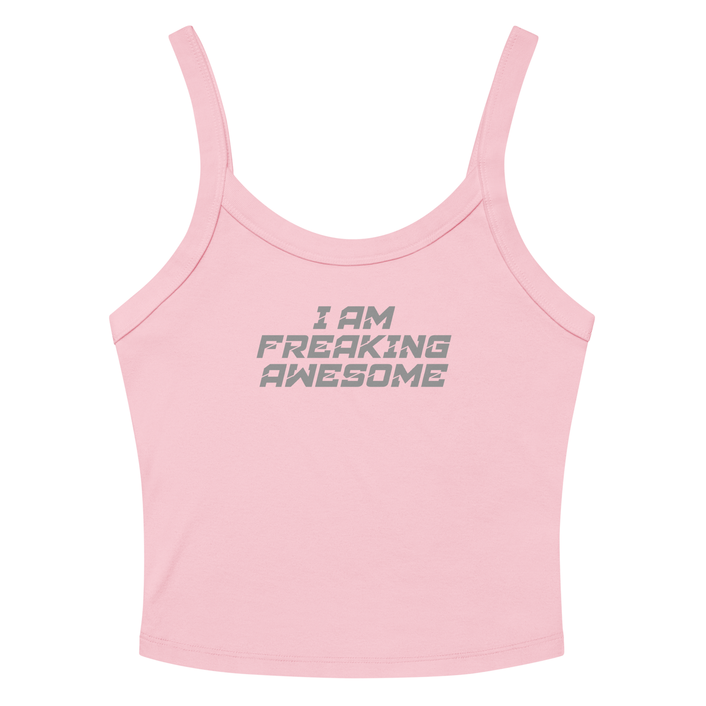 "I Am Freaking Awesome" printed on a solid pink blend women's micro-rib tanktop laying on a flat surface amongst sunglasses and shorts