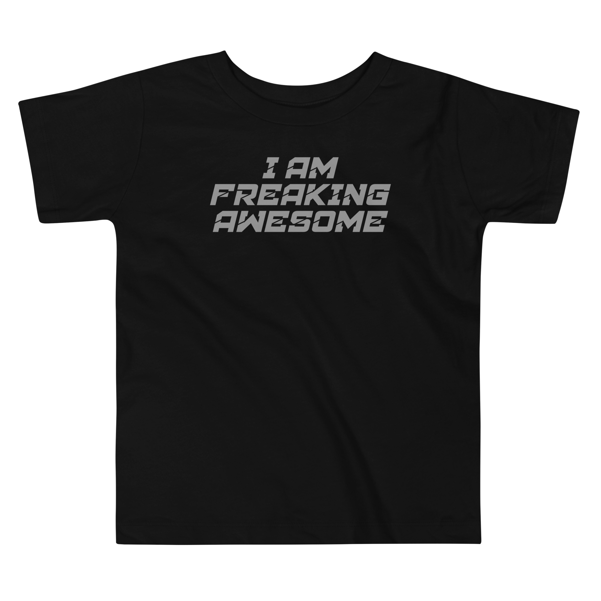 "I Am Freaking Awesome" printed on a black toddler short sleeve tee laying on a flat surface