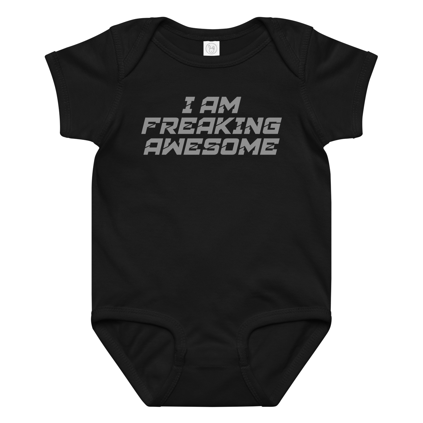 "I Am Freaking Awesome" printed on a black baby jersey bodysuit laying on a flat surface amongst other clothes