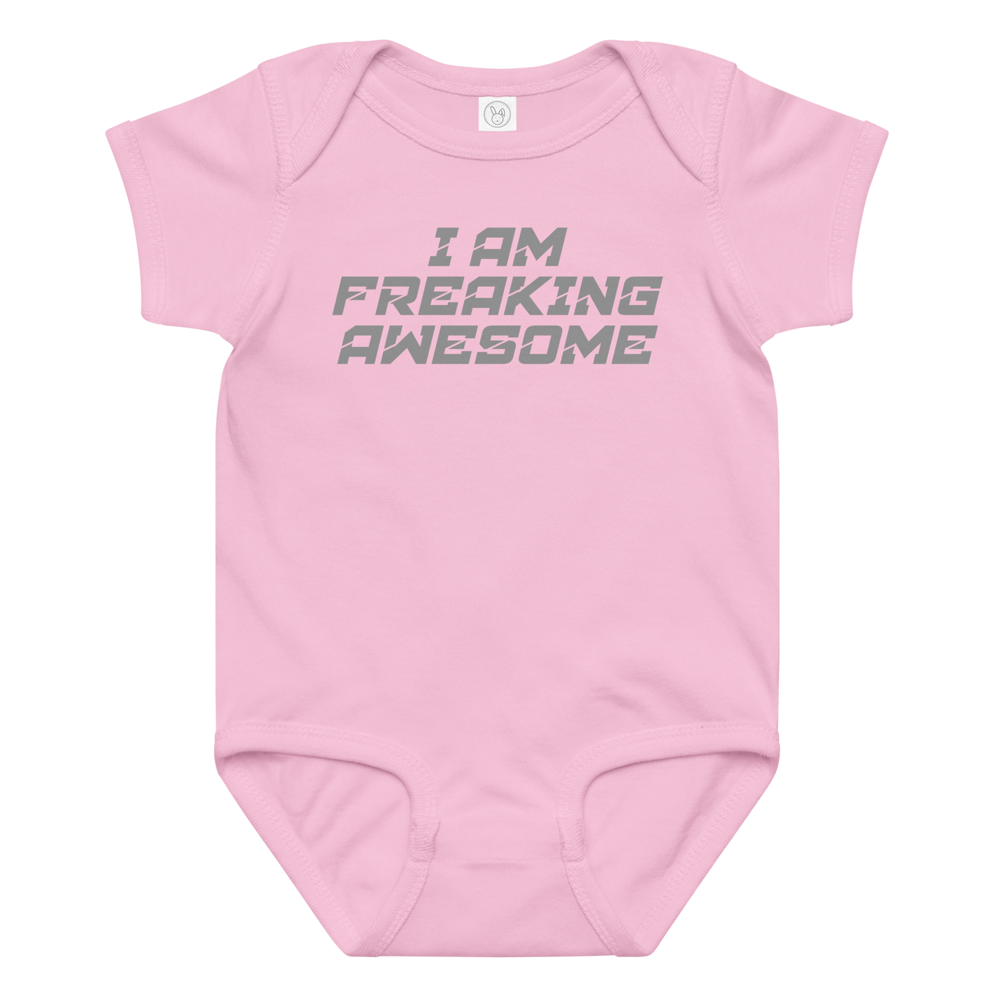 "I Am Freaking Awesome" printed on a pink baby jersey bodysuit laying on a flat surface amongst other clothes