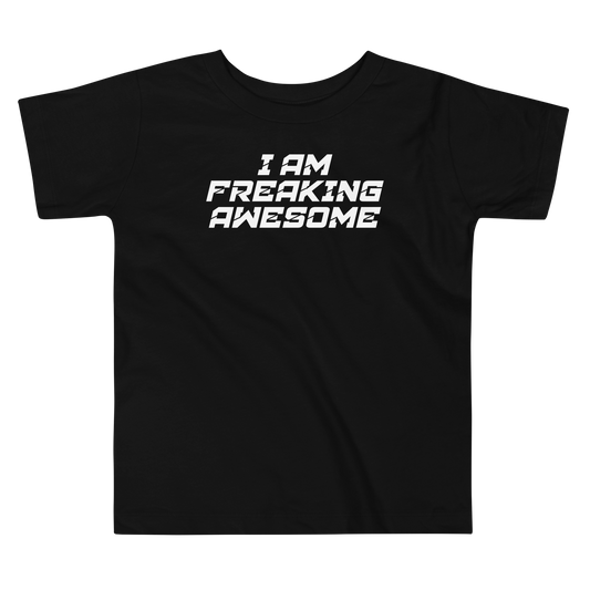 "I Am Freaking Awesome" printed on a black toddler short sleeve tee laying on a flat surface