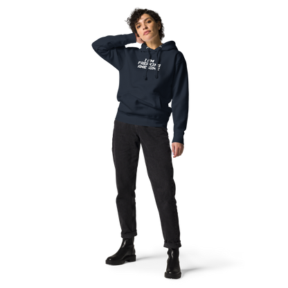 "I Am Freaking Awesome" printed on a navy blazer unisex hoodie worn by a female