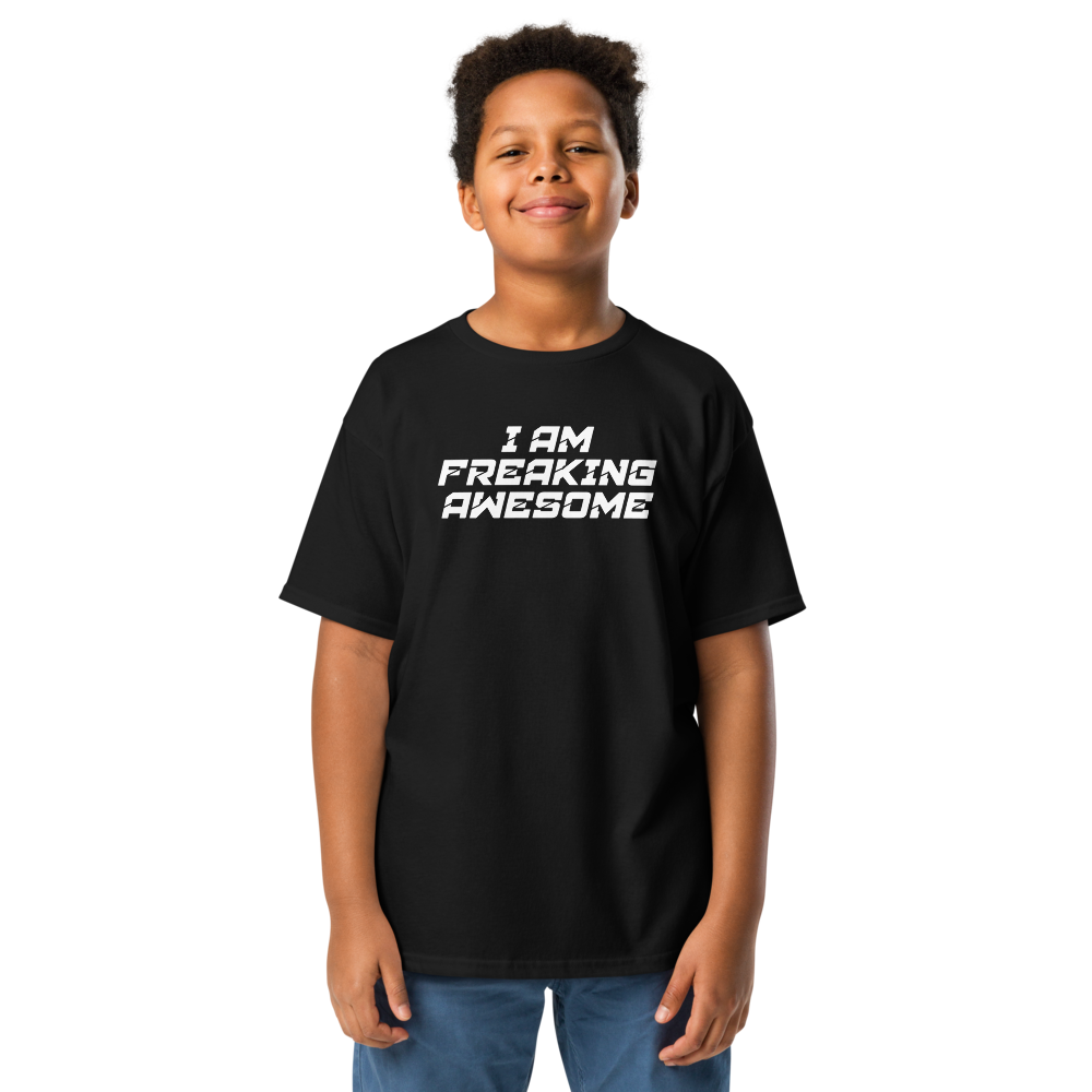 "I Am Freaking Awesome" printed on a black youth classic tee worn by a male
