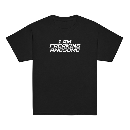 "I Am Freaking Awesome" printed on a black youth classic tee laying on a flat surface