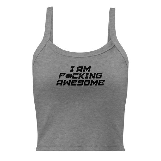 "I Am F*cking Awesome" printed on a athletic heather women's micro-rib tanktop laying on a flat surface