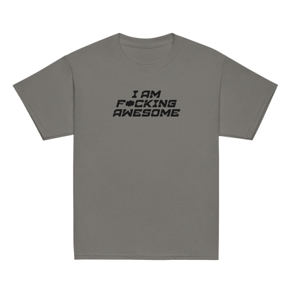 "I Am F*cking Awesome" printed on a charcoal youth classic tee laying on a flat surface