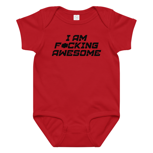 "I Am F*cking Awesome" printed on a red baby jersey bodysuit laying on a flat surface amongst other clothes