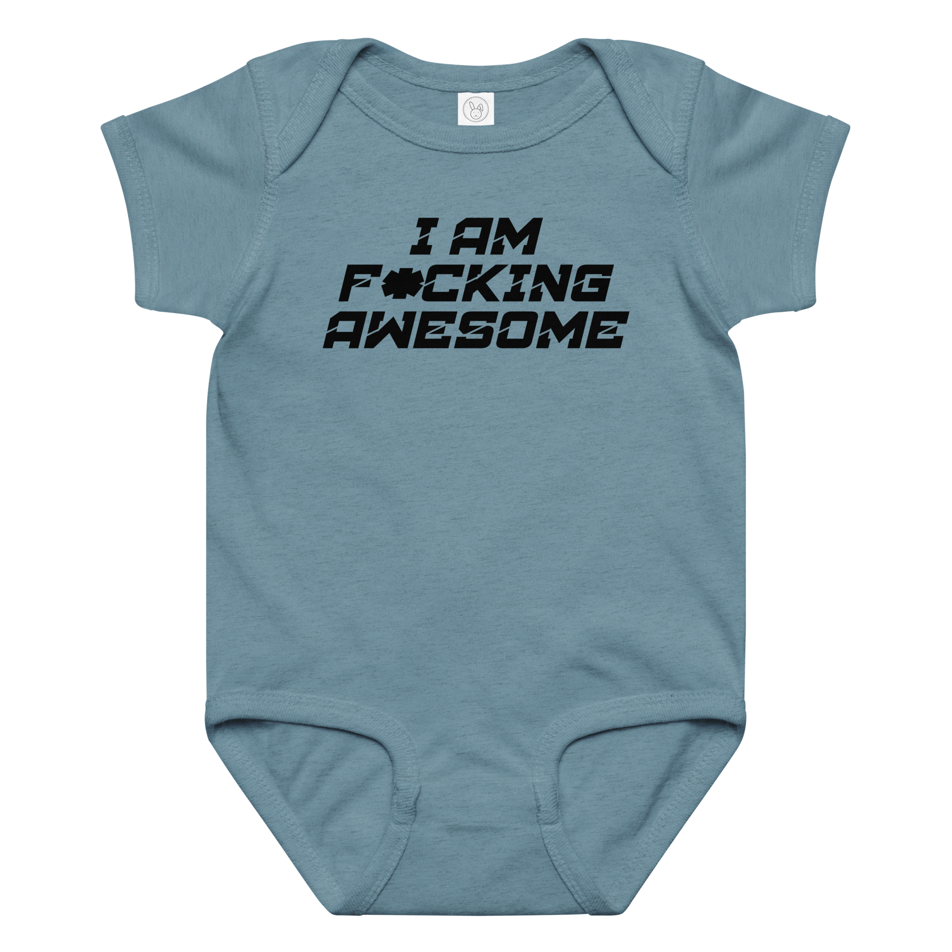 "I Am F*cking Awesome" printed on a vintage indigo baby jersey bodysuit laying on a flat surface amongst other clothes
