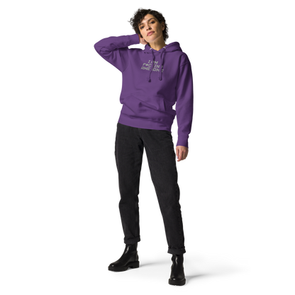 "I Am F*cking Awesome" printed on a purple unisex hoodie worn by a female