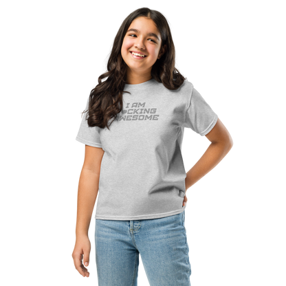 "I Am F*cking Awesome" printed on a sport grey youth classic tee worn by a female