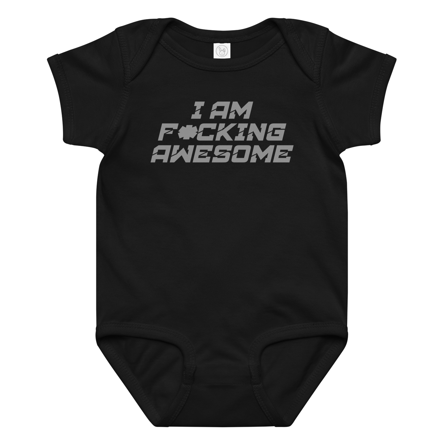 "I Am F*cking Awesome" printed on a black baby jersey bodysuit laying on a flat surface amongst other clothes