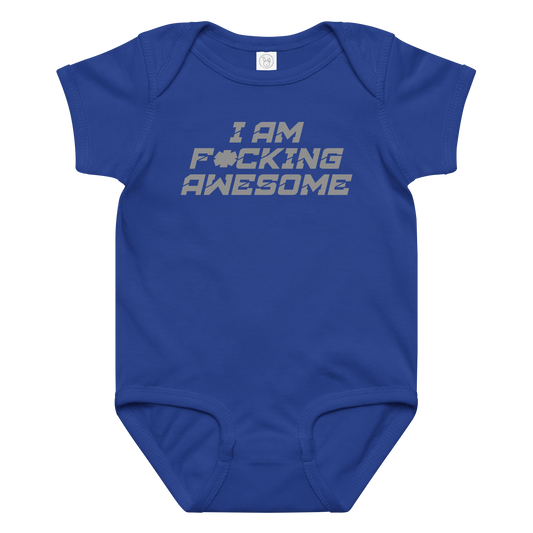 "I Am F*cking Awesome" printed on a royal baby jersey bodysuit laying on a flat surface amongst other clothes