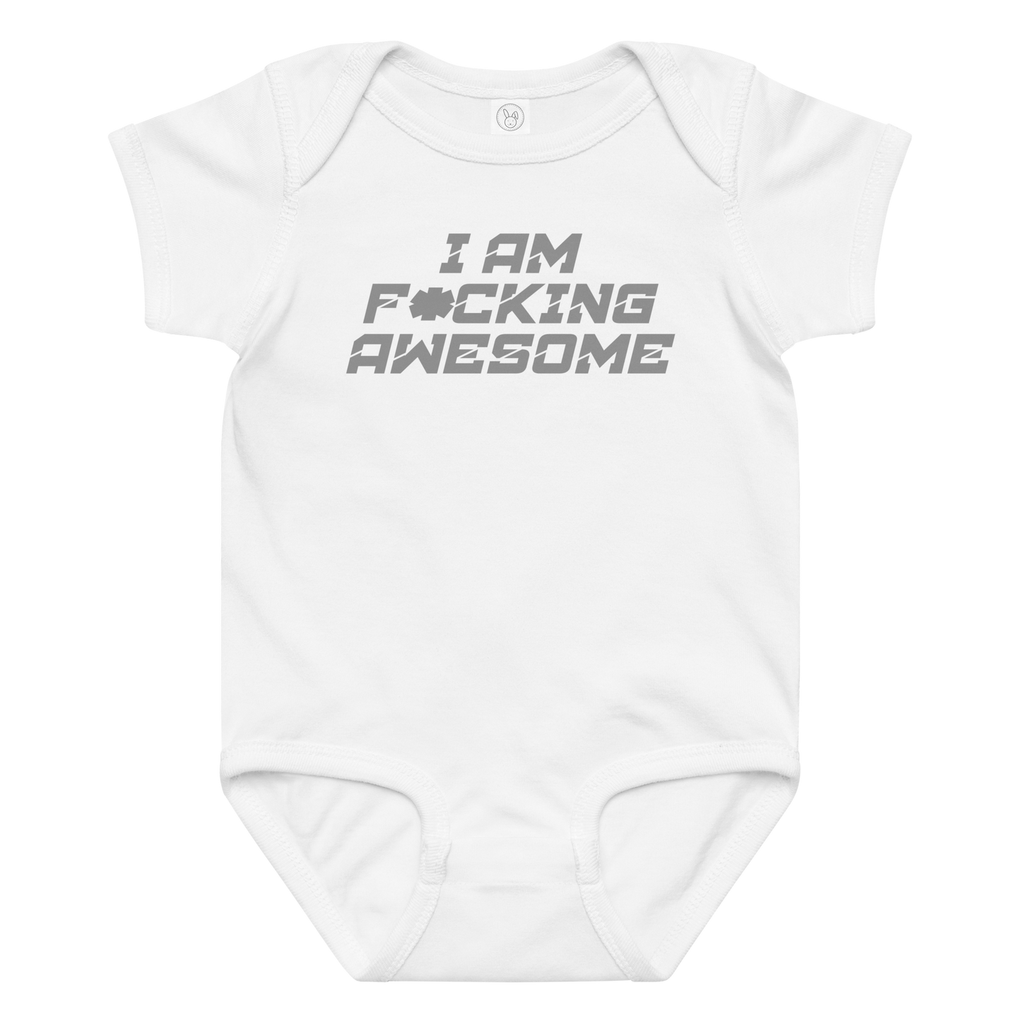 "I Am F*cking Awesome" printed on a white baby jersey bodysuit laying on a flat surface amongst other clothes
