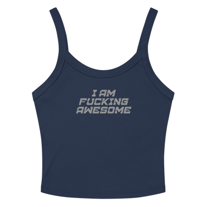 "I Am Fucking Awesome" printed on a solid navy blend women's micro-rib tanktop laying on a flat surface amongst sunglasses and shorts