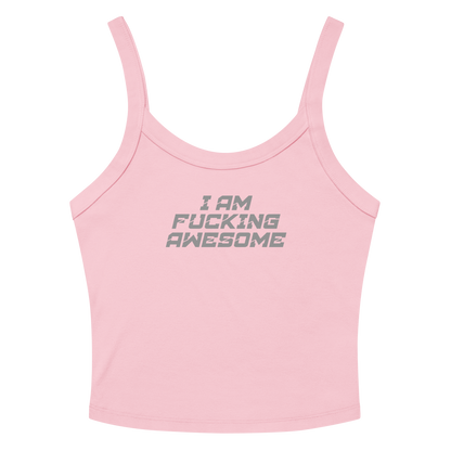 "I Am Fucking Awesome" printed on a solid pink blend women's micro-rib tanktop laying on a flat surface amongst sunglasses and shorts