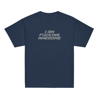 "I Am Fucking Awesome" printed on a navy youth classic tee laying on a flat surface