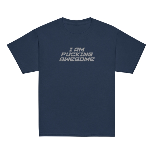 "I Am Fucking Awesome" printed on a navy youth classic tee laying on a flat surface