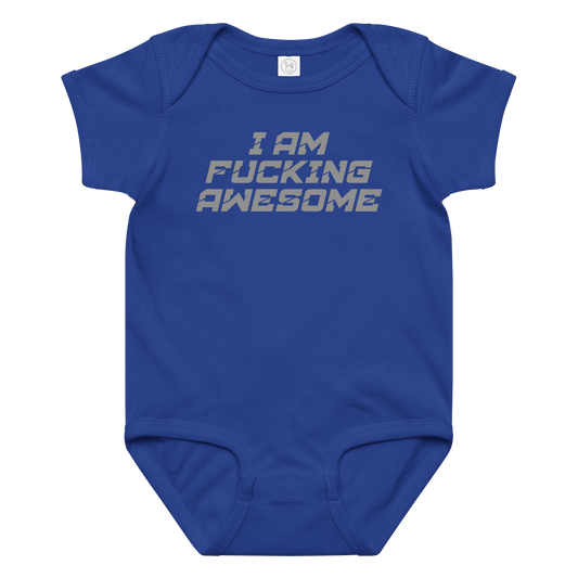 "I Am Fucking Awesome" printed on a royal baby jersey bodysuit laying on a flat surface amongst other clothes