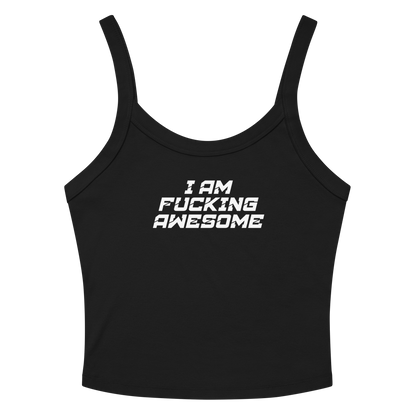 "I Am Fucking Awesome" printed on a solid black blend women's micro-rib tanktop laying on a flat surface amongst sunglasses and shorts