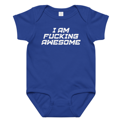 "I Am Fucking Awesome" printed on a royal baby jersey bodysuit laying on a flat surface amongst other clothes
