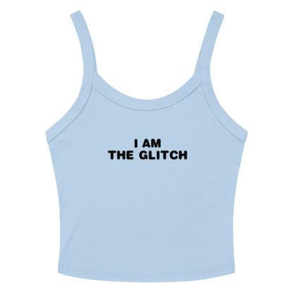 "I am the glitch" printed on a solid baby blue blend women's micro-rib tanktop laying on a flat surface amongst sunglasses and shorts