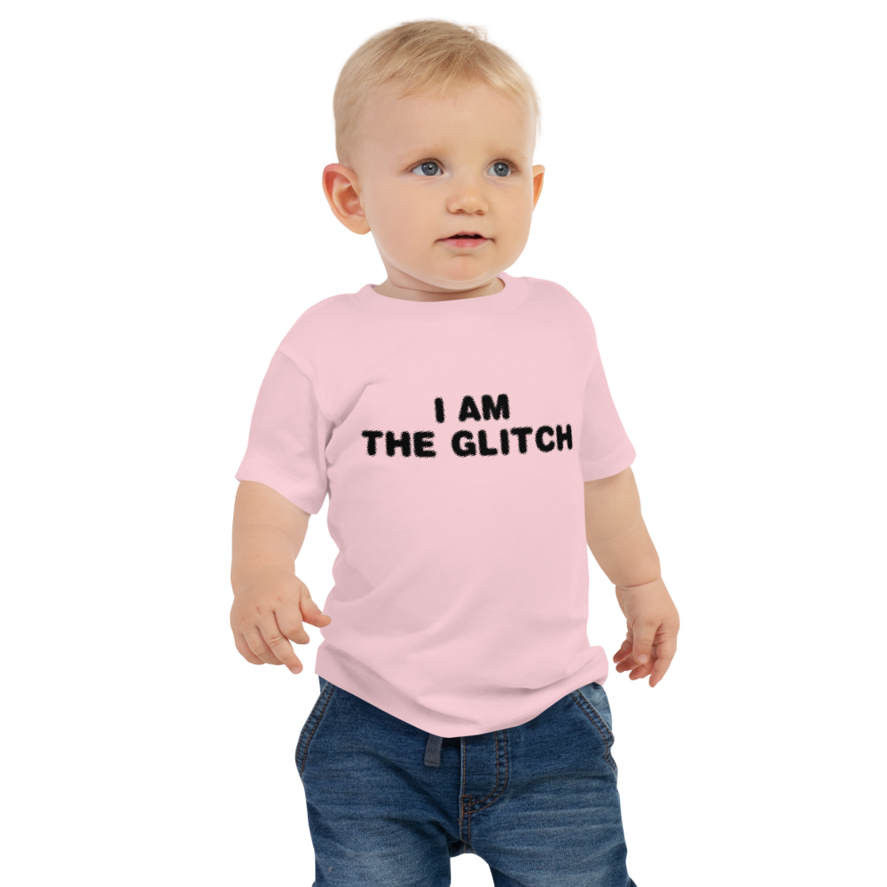 "I am the glitch" printed on a pink baby jersey short sleeve tee worn by a male