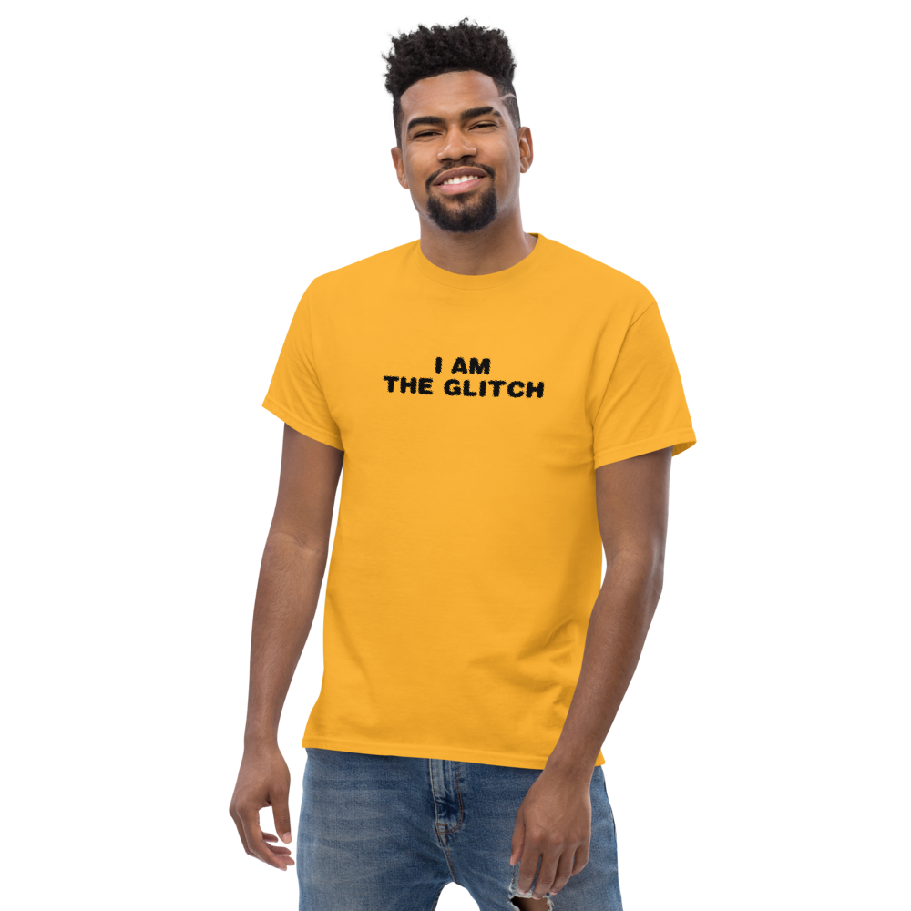 "I am the glitch" printed on a gold unisex classic tee worn by a male