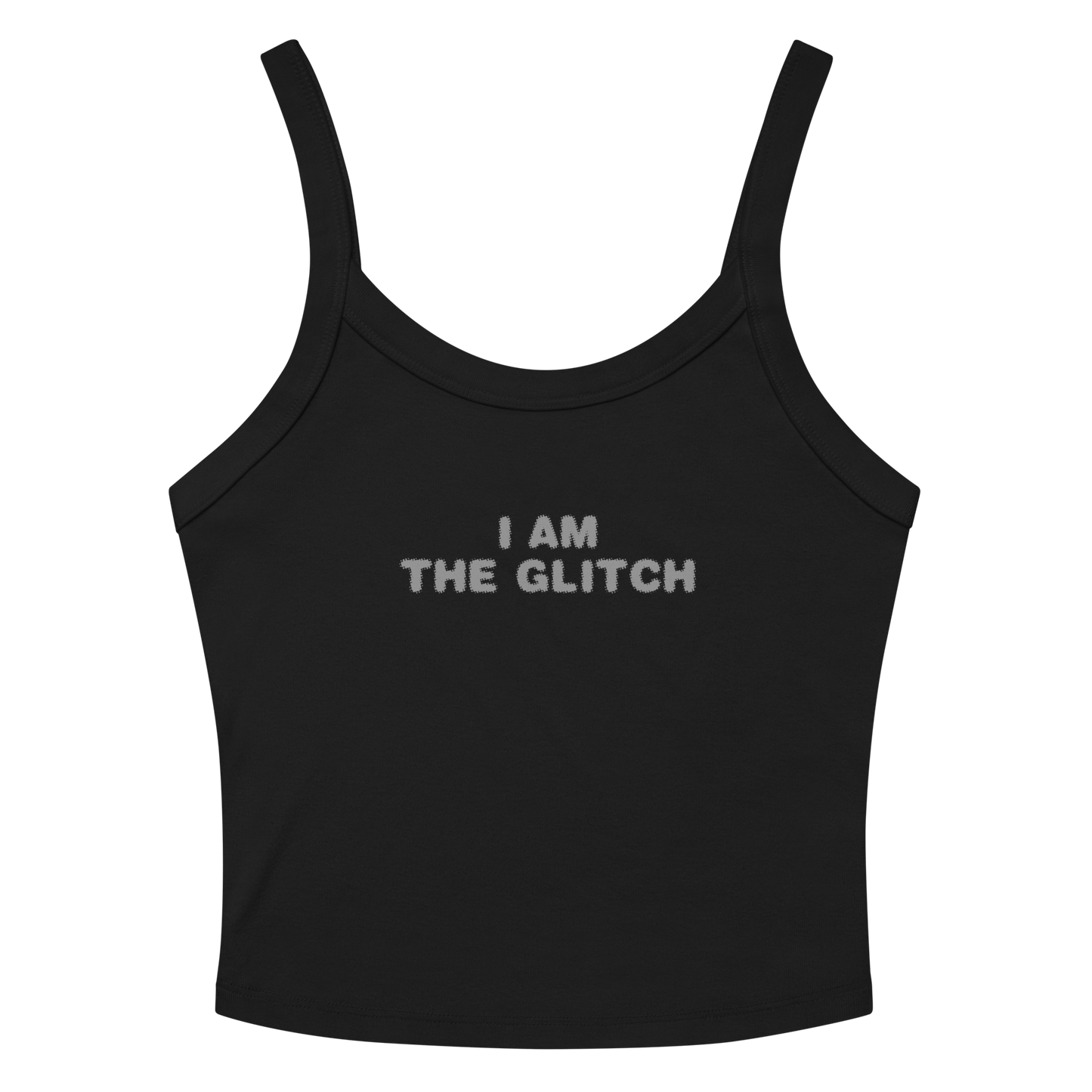 "I am the glitch" printed on a solid black blend women's micro-rib tanktop laying on a flat surface amongst sunglasses and shorts