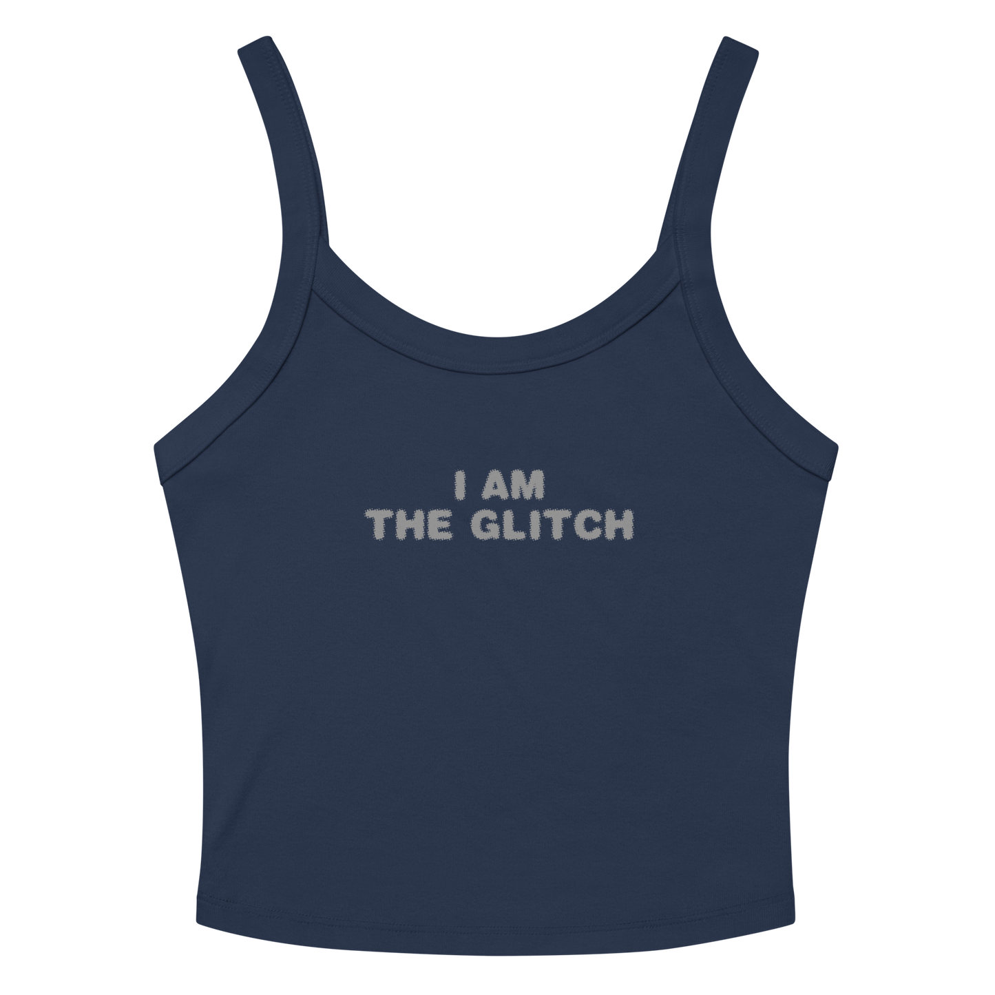 "I am the glitch" printed on a solid navy blend women's micro-rib tanktop laying on a flat surface amongst sunglasses and shorts