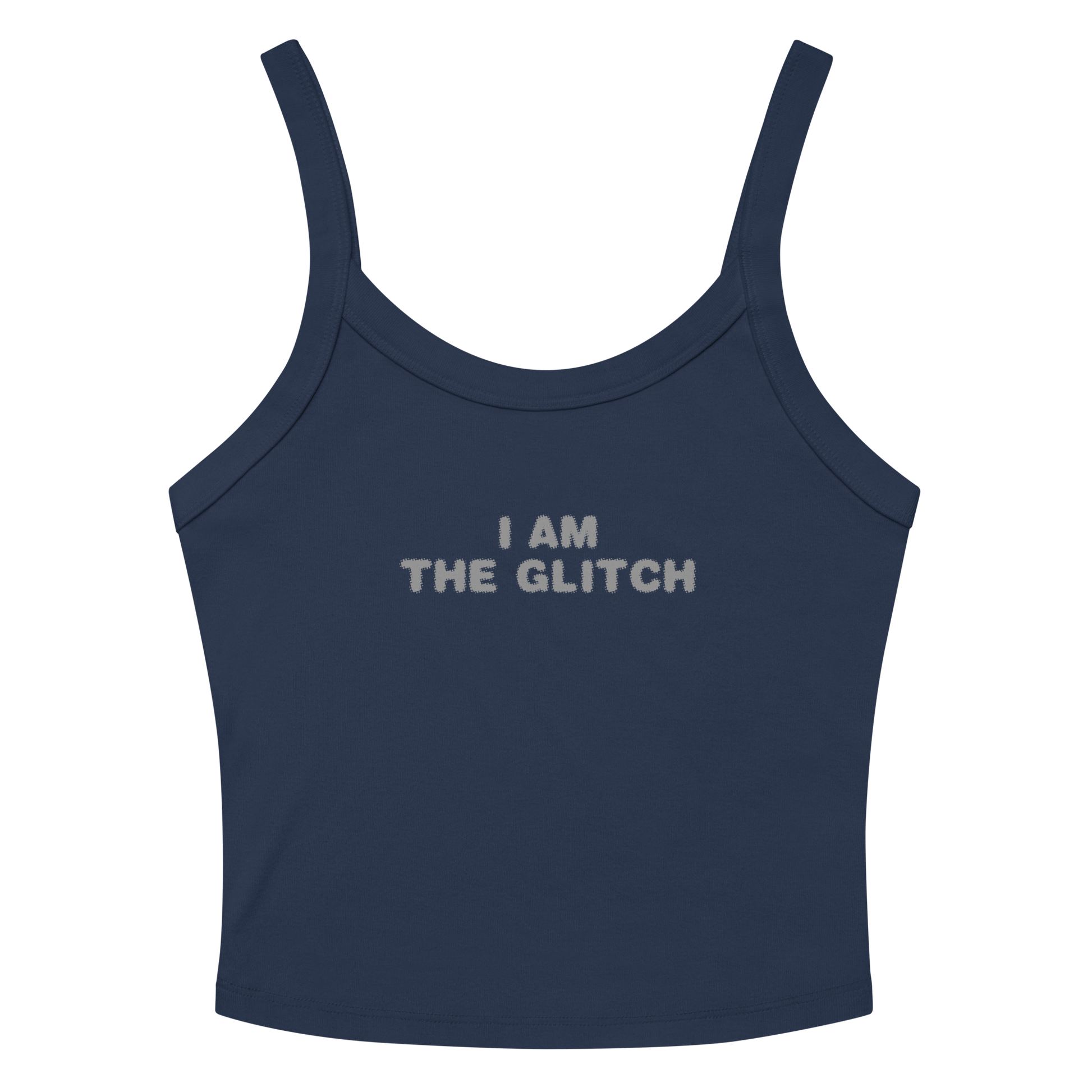 "I am the glitch" printed on a solid navy blend women's micro-rib tanktop laying on a flat surface amongst sunglasses and shorts