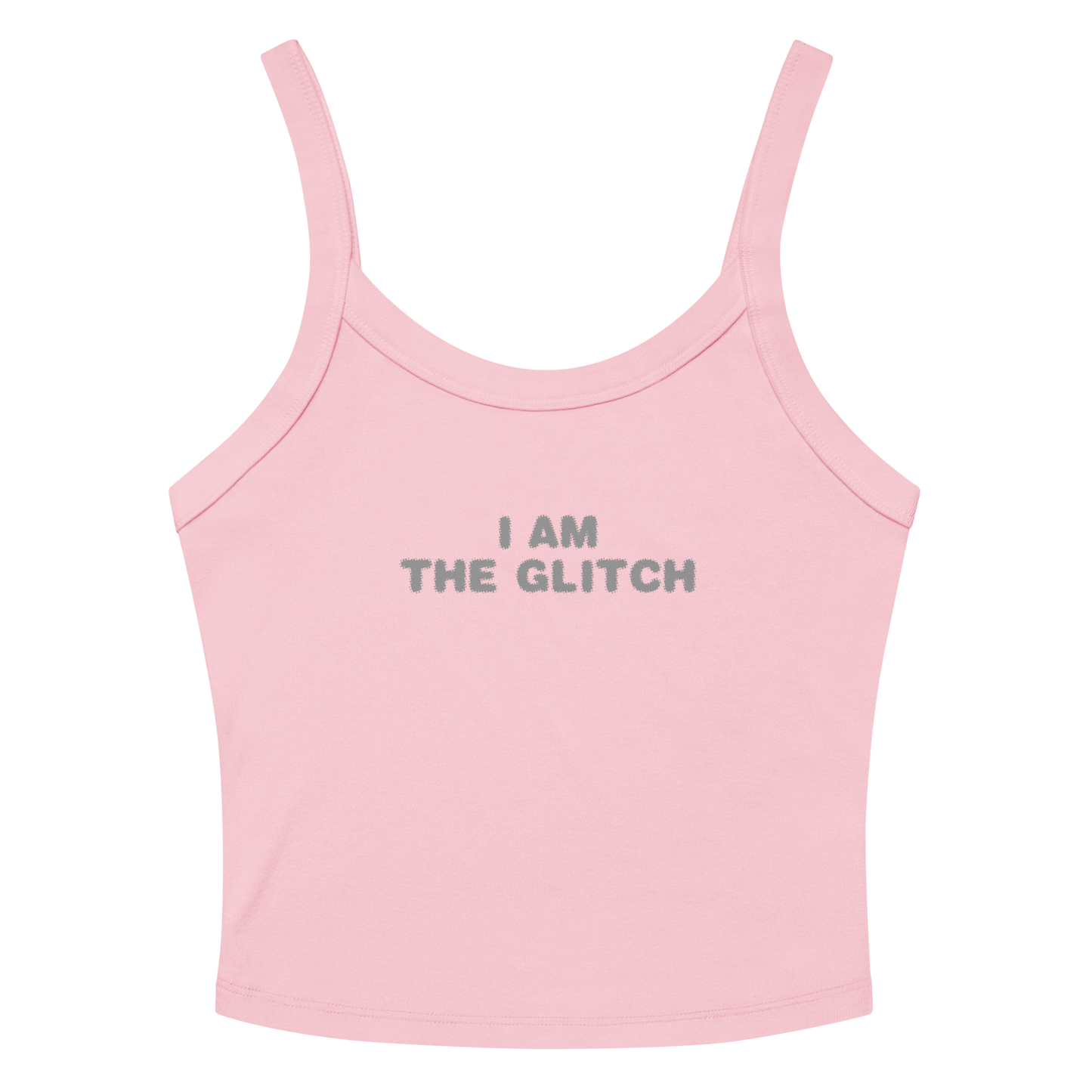 "I am the glitch" printed on a solid pink blend women's micro-rib tanktop laying on a flat surface amongst sunglasses and shorts