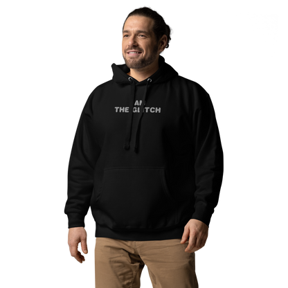 "I am the glitch" printed on a black unisex hoodie worn by a male