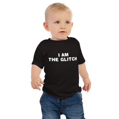 "I am the glitch" printed on a black baby jersey short sleeve tee worn by a male
