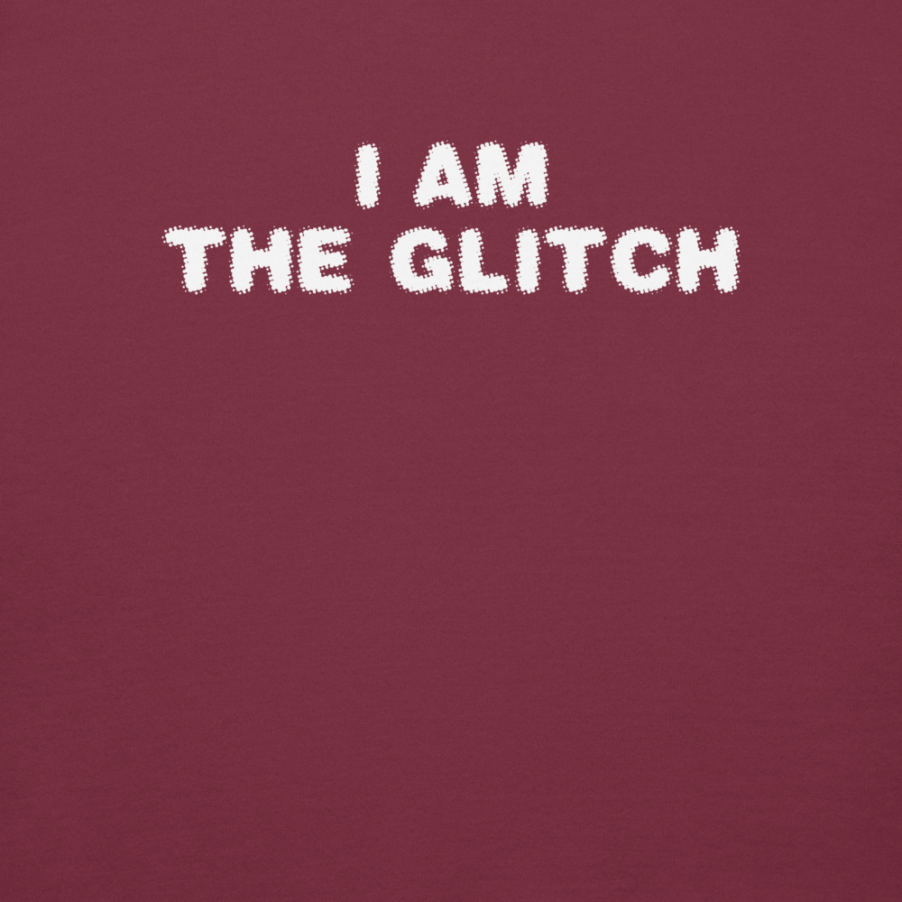 "I am the glitch" printed on a maroon background