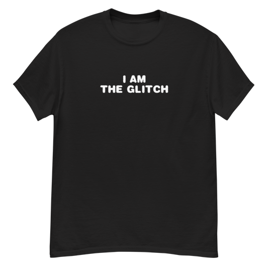 "I am the glitch" printed on a black unisex classic tee laying on a flat surface