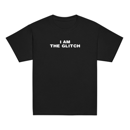"I am the glitch" printed on a black youth classic tee laying on a flat surface