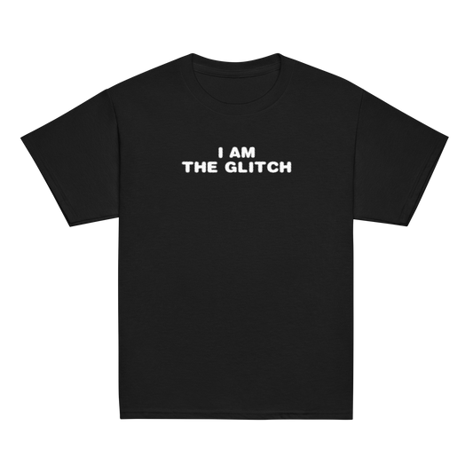 "I am the glitch" printed on a black youth classic tee laying on a flat surface