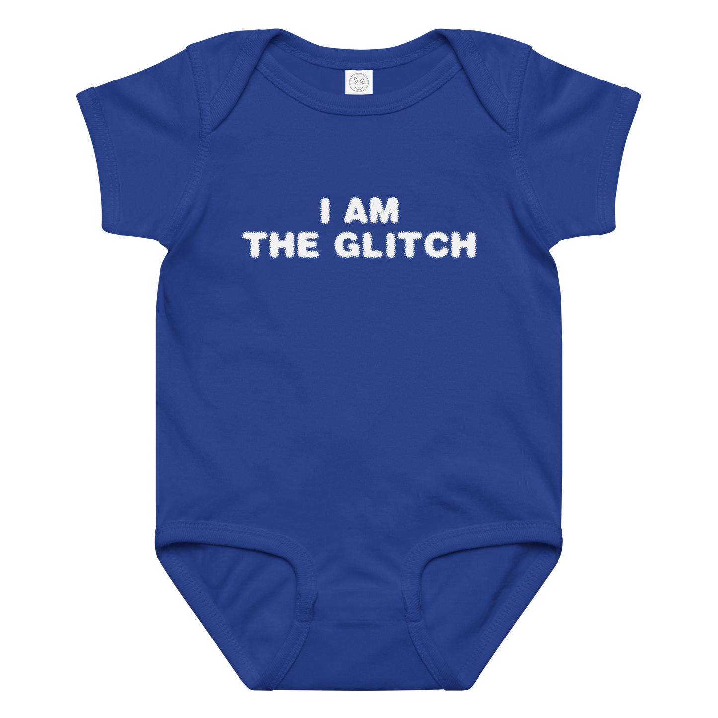 "I am the glitch" printed on a royal baby jersey bodysuit laying on a flat surface amongst other clothes
