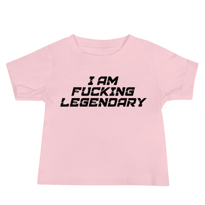 "I Am Fucking Legendary" printed on a pink baby jersey short sleeve tee laying on a flat surface