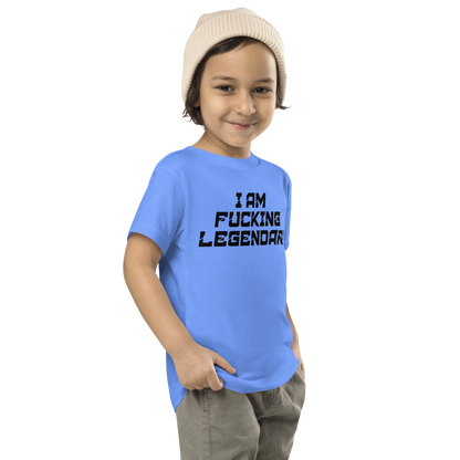 "I Am Fucking Legendary" printed on a heather columbia blue toddler short sleeve tee worn by a male who is also wearing a knit cap