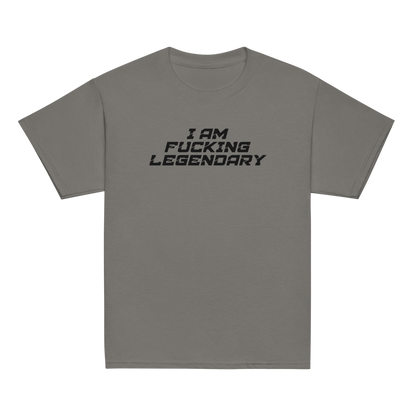 "I Am Fucking Legendary" printed on a charcoal youth classic tee laying on a flat surface