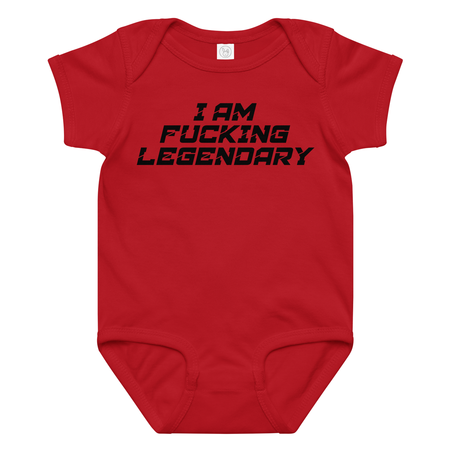 "I Am Fucking Legendary" printed on a red baby jersey bodysuit laying on a flat surface amongst other clothes
