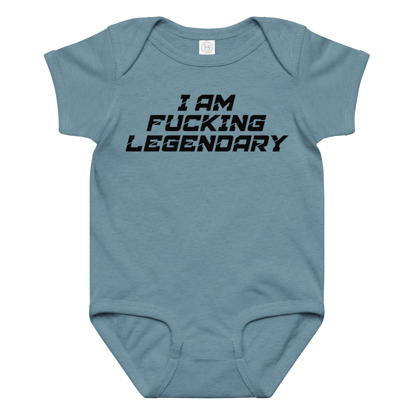 "I Am Fucking Legendary" printed on a vintage indigo baby jersey bodysuit laying on a flat surface amongst other clothes