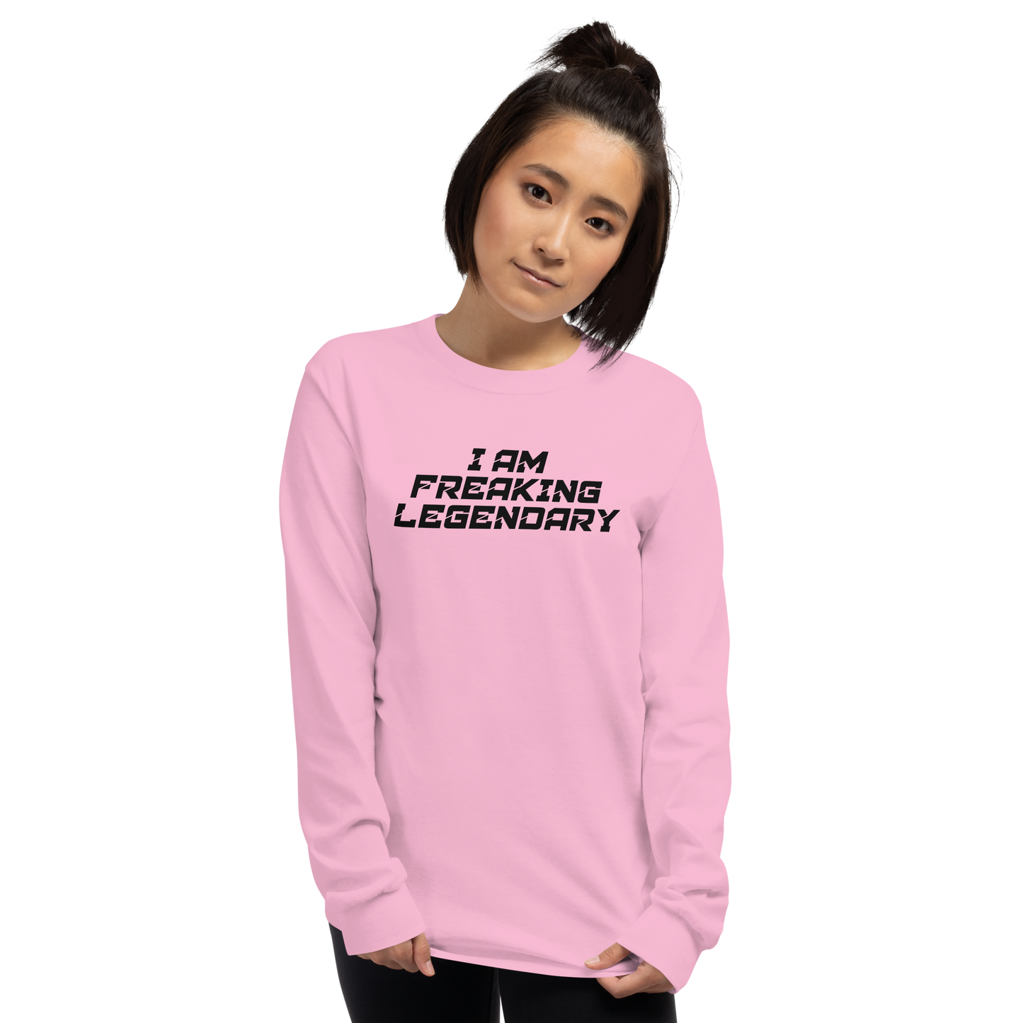 "I Am Freaking Legendary" printed on a light pink men's long sleeve shirt worn by a female